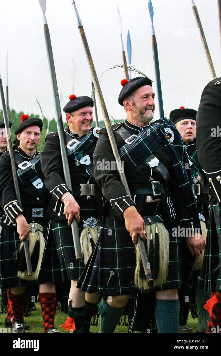 Men of the Lonach Highlanders marching at the annual Lonach Gathering and Highland Games at Strathdon, Grampian Region, Scotland Stock Photo