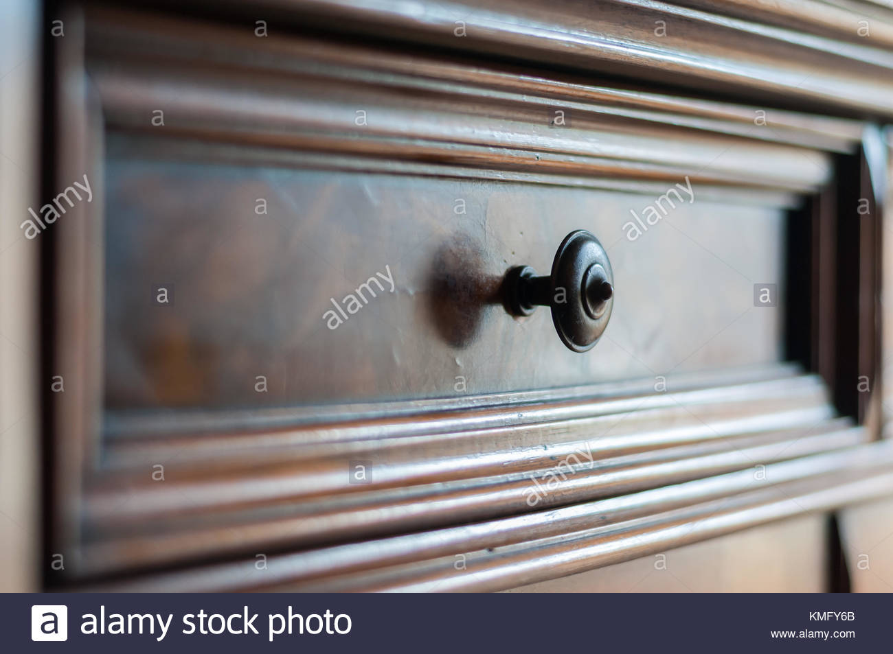 Detail Of An Antique Wood Furniture With Focus On The Metallic