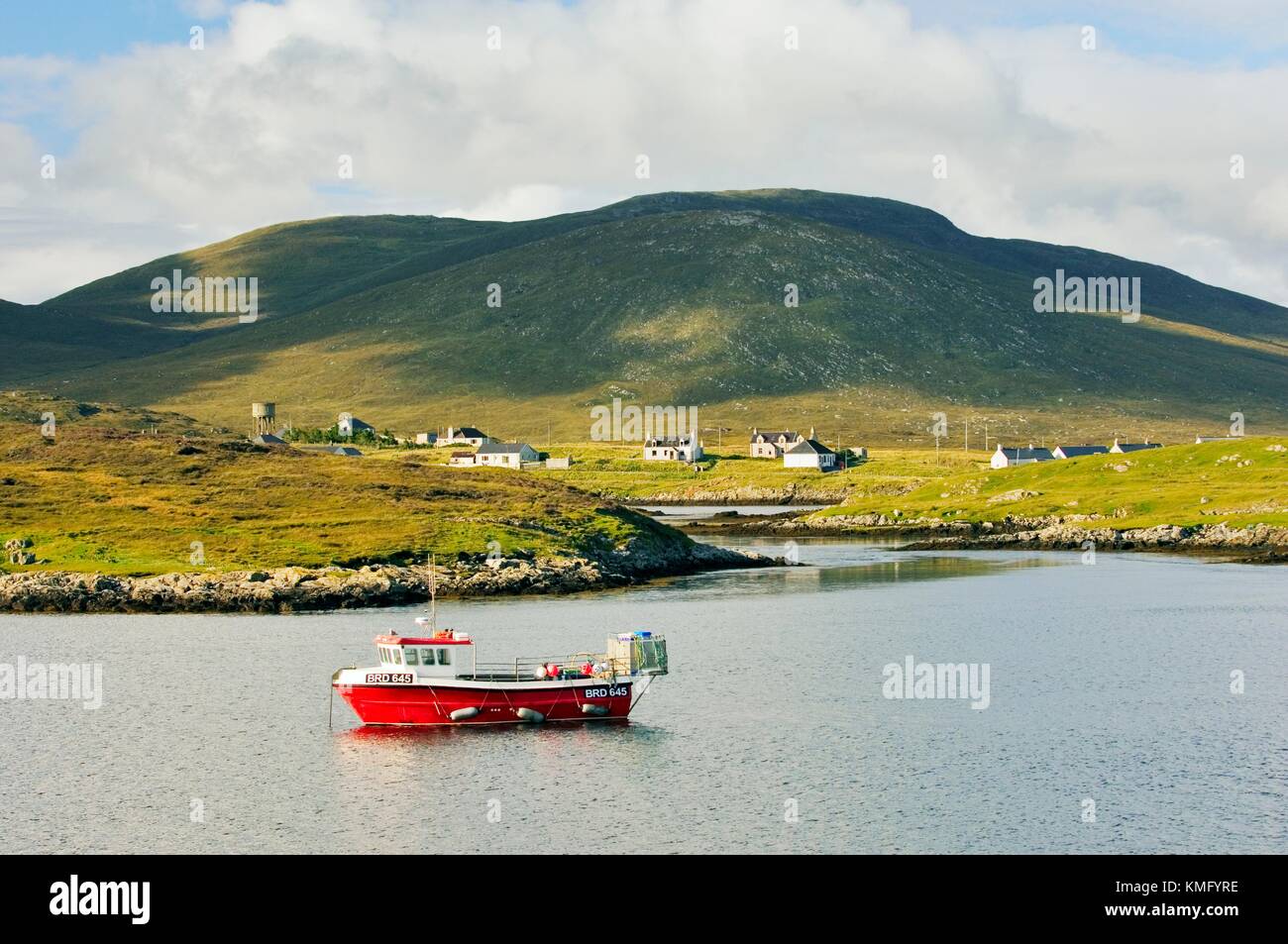 Fishing boat and crofts in the village of Leverburgh on Harris, Western Isles, Scotland Stock Photo