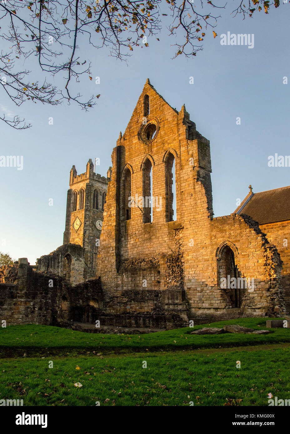 KILWINNING, SCOTLAND - NOVEMBER 12 2017: The ruins of Kilwinning Abbey during the golden hour. This abbey was home to the Tironensian monks. Stock Photo