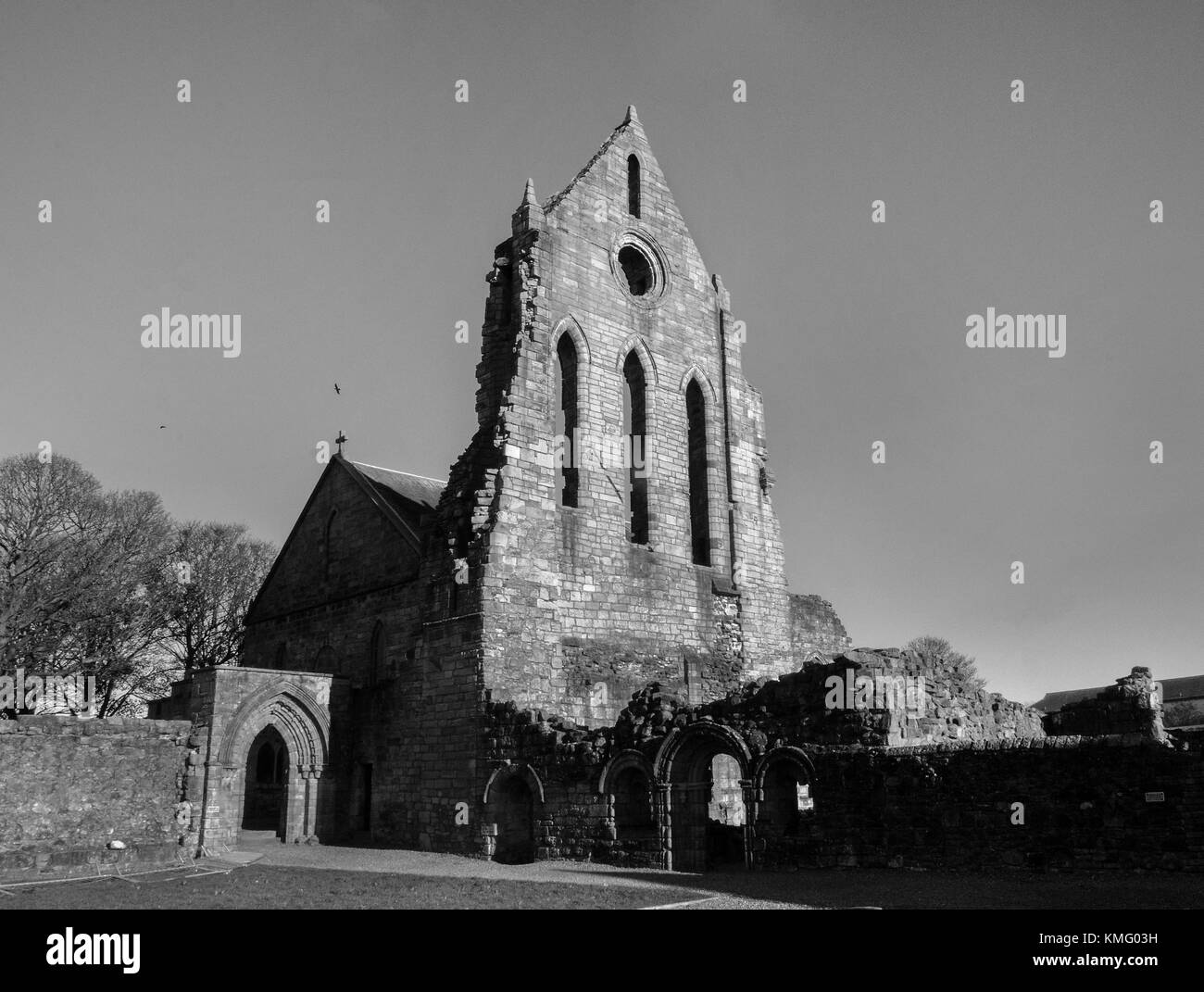 KILWINNING, SCOTLAND - NOVEMBER 12 2017: A black and white photograph of the ruins of Kilwinning Abbey which was home to the Tironensian monks. Stock Photo