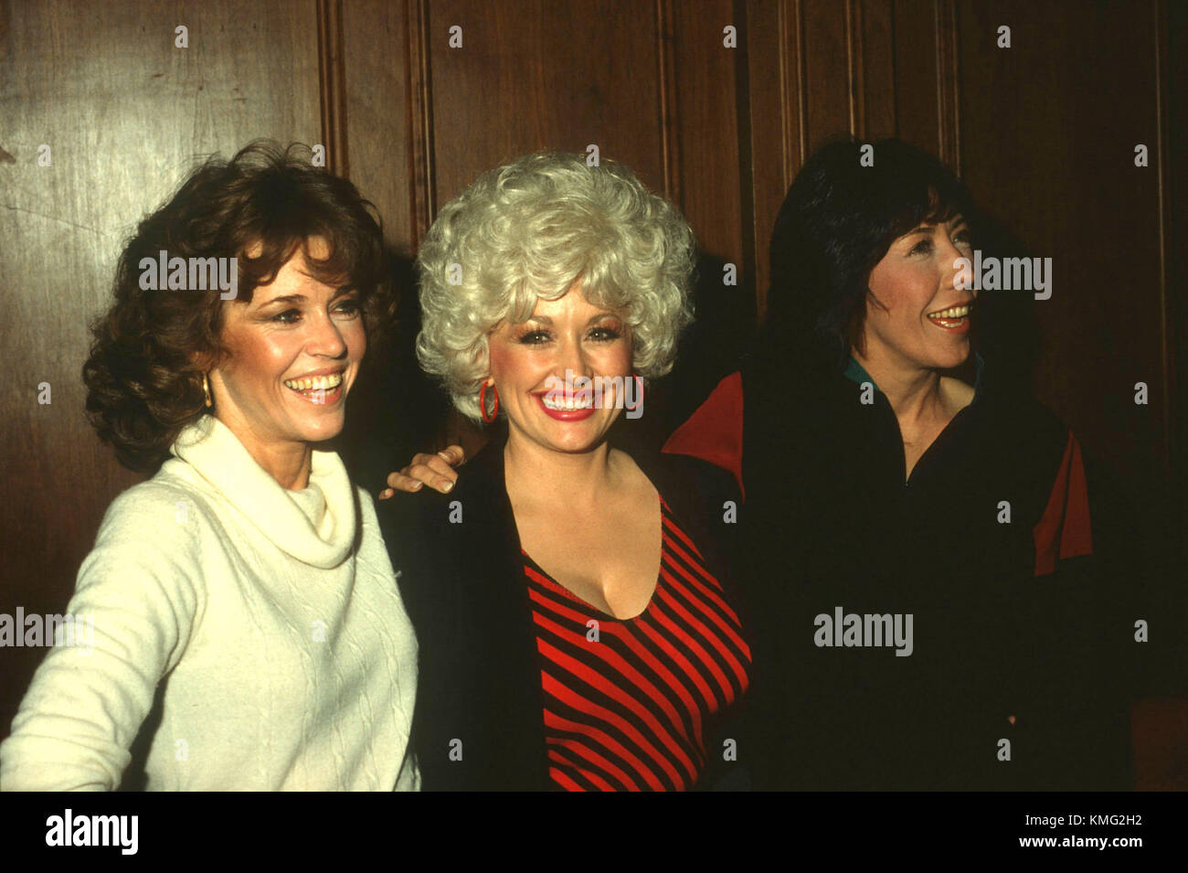 LOS ANGELES, CA - DECEMBER 11: (L-R) Actress Jane Fonda, singer Dolly Parton and comedian/actress Lily Tomlin attend the 9 to 5 press conference at the Century Plaza Hotel in Los Angeles, California on December 11, 1980. Photo by Barry King/Alamy Stock Photo