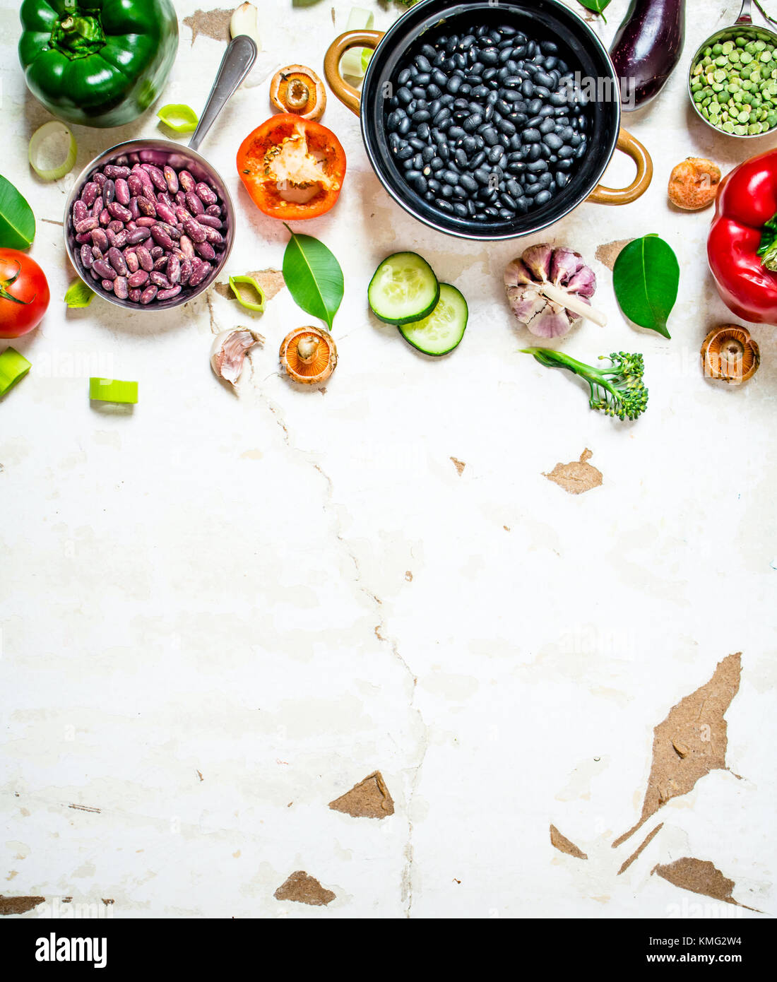 Healthy organic food. Fresh raw vegetables with beans and lentils. On ...