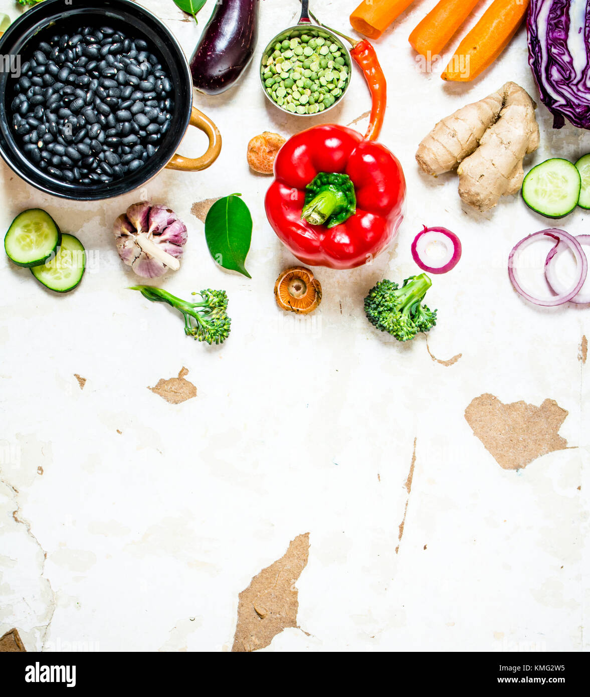 Healthy organic food. Fresh raw vegetables with beans and lentils. On ...