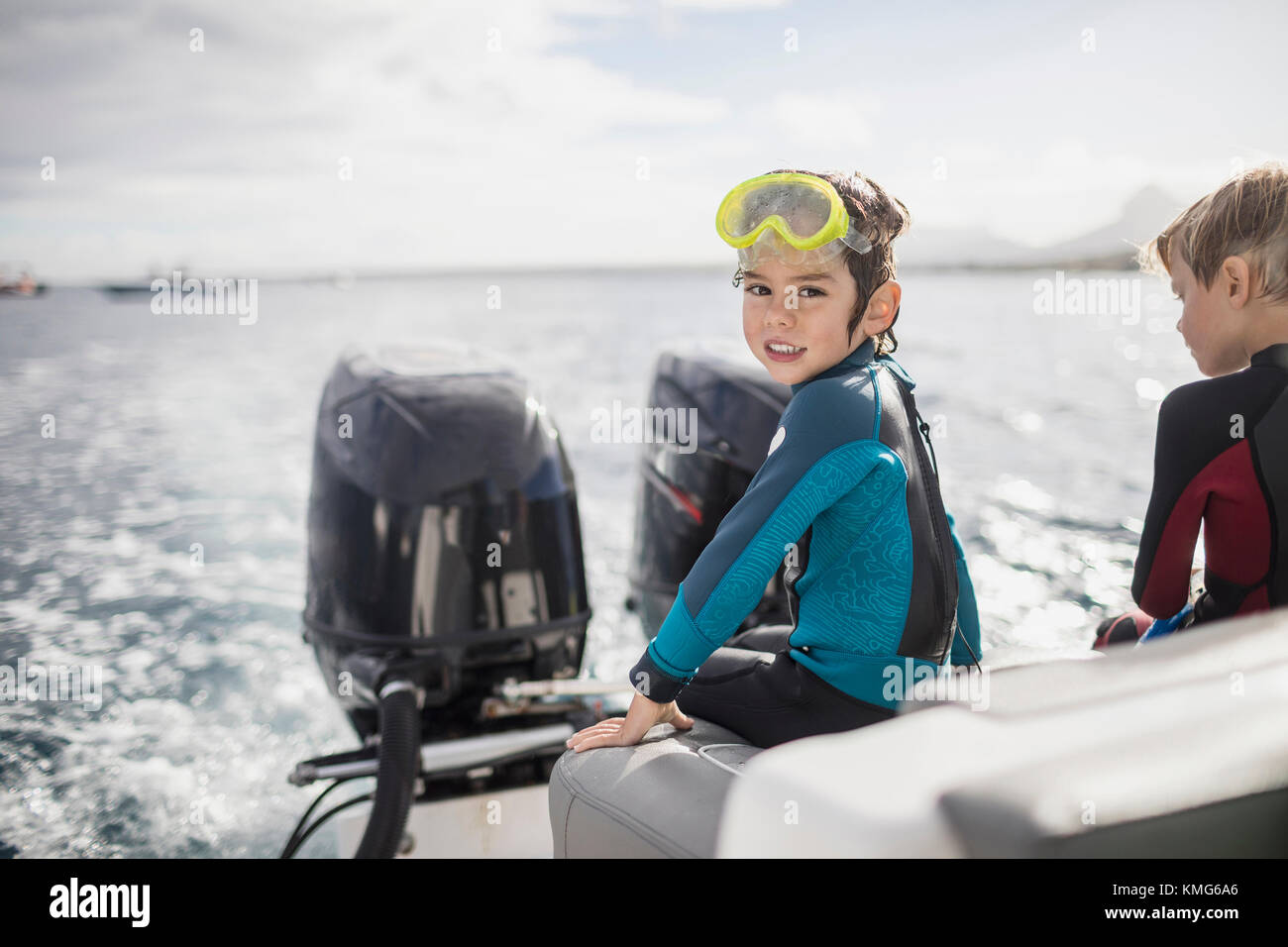 Children with diving mask on a boat Stock Photo