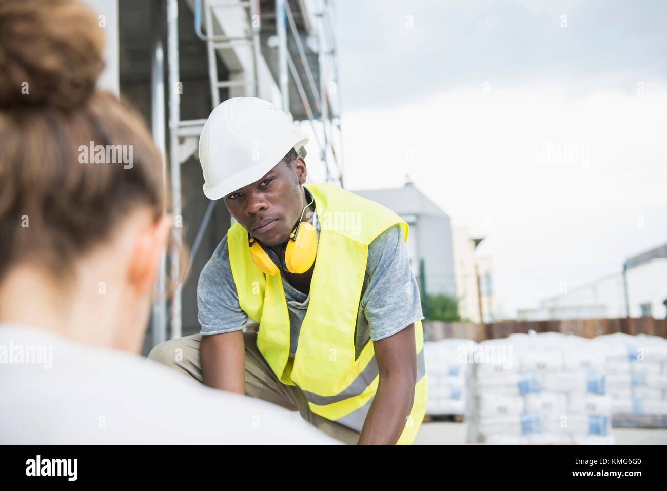 Portrait of a construction worker at building site Stock Photo - Alamy