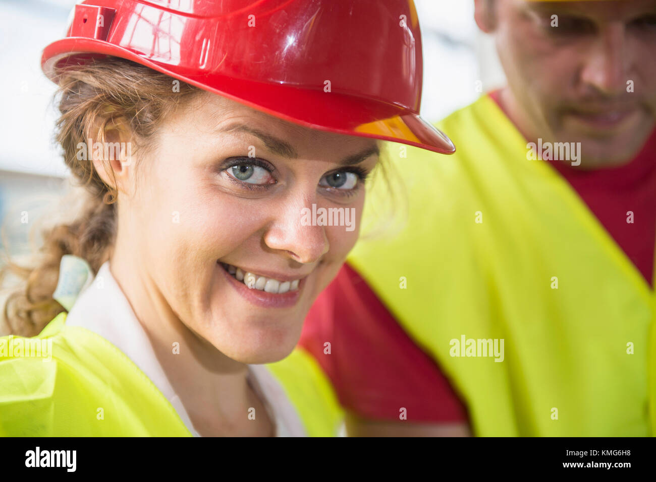 Portrait of construction worker at building site Stock Photo - Alamy