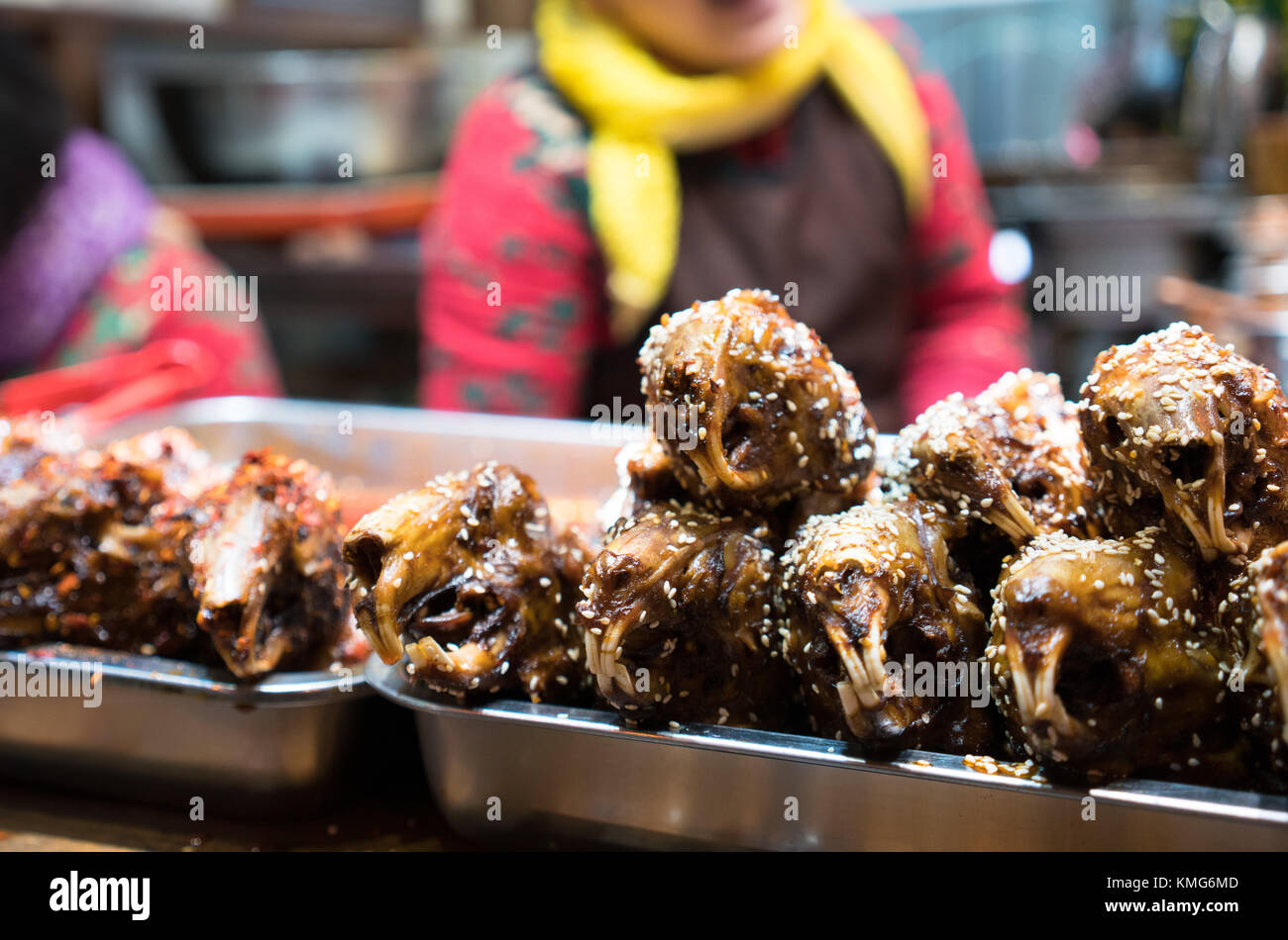 Spicy rabbit head street food in Chengdu China Stock Photo