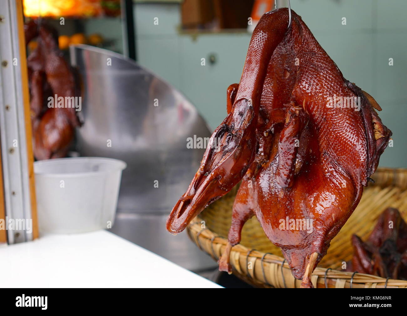 Hanging roasted duck street food in China Stock Photo