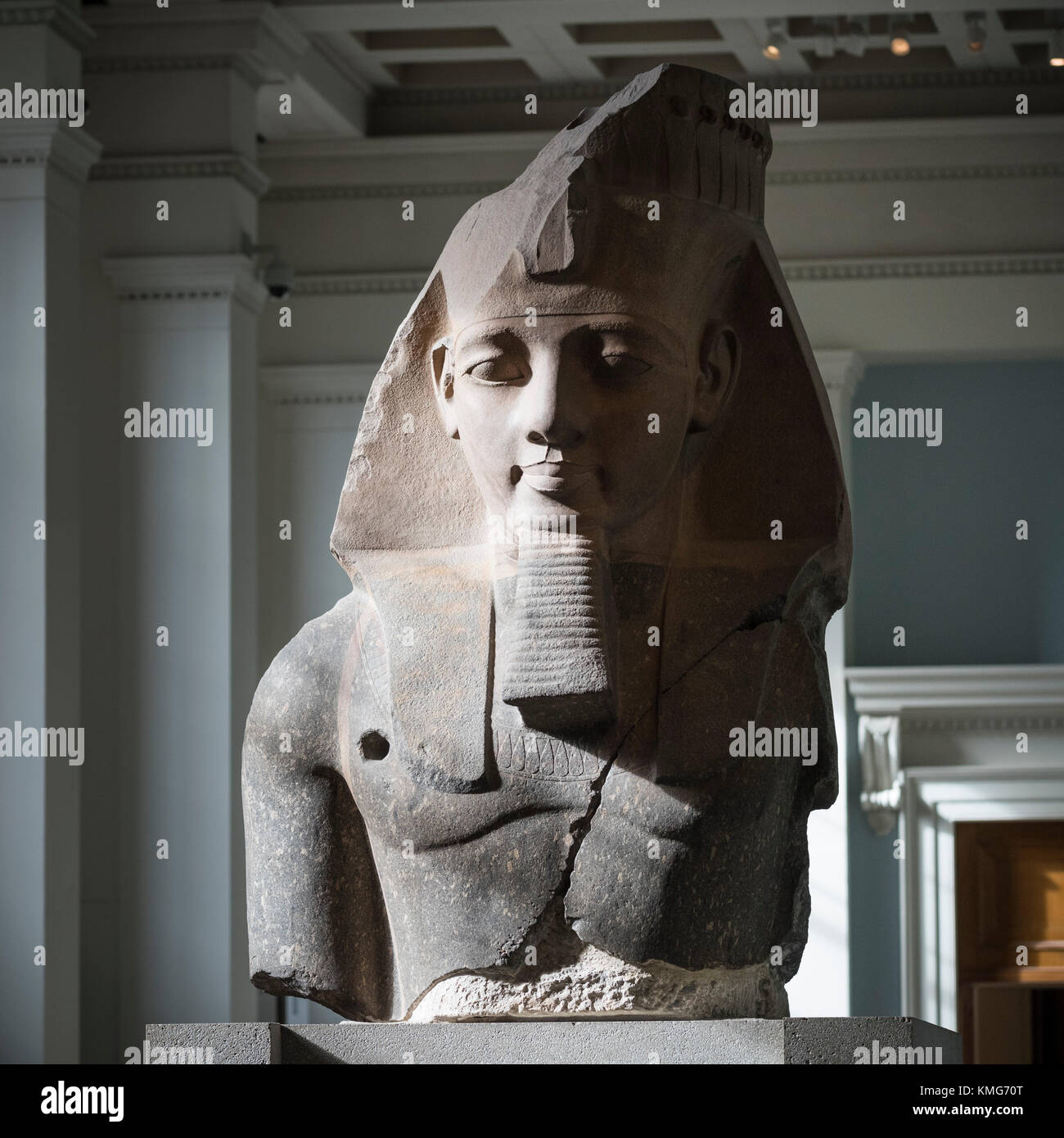 London. England. British Museum. Colossal head of Egyptian Pharaoh  Ramesses II, ca. 1250 B.C, from the mortuary temple of Ramesses II. Stock Photo