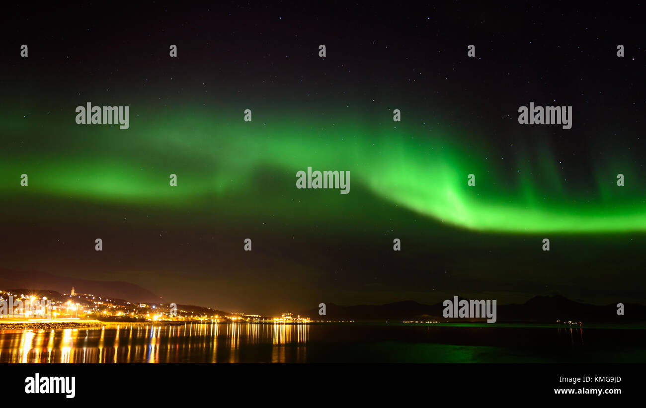 A beautiful green Aurora borealis or northern lights in the sky at Tromso, Norway Stock Photo