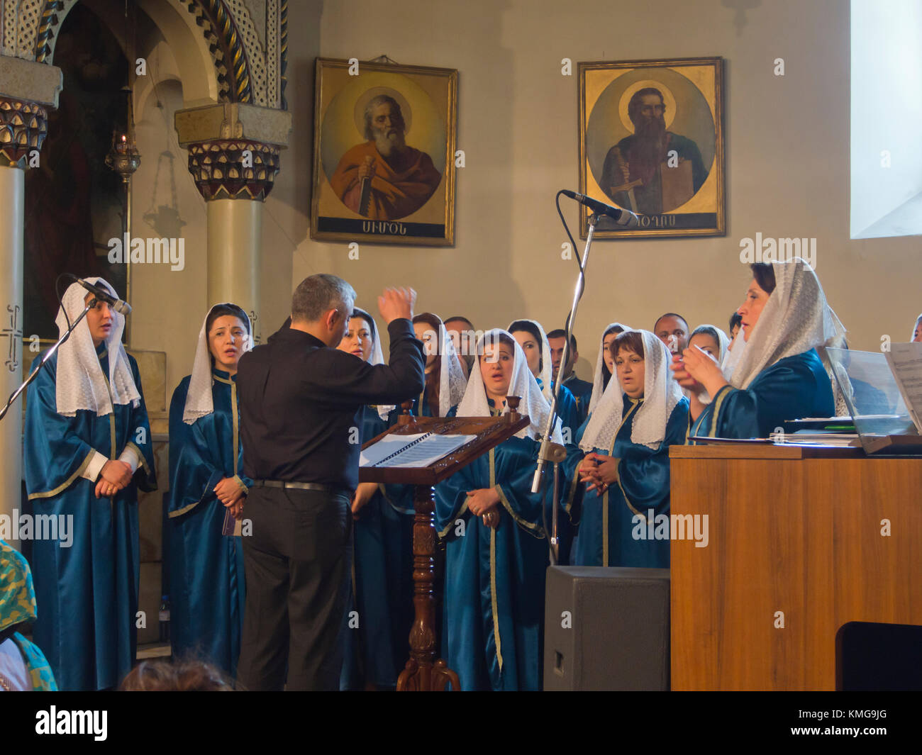 Sunday mass in the imposing cathedral at Mother See of Holy Etchmiadzin, seat of the Apostolic Church, in Vagharshapat, Armenia, beautiful choir songs Stock Photo