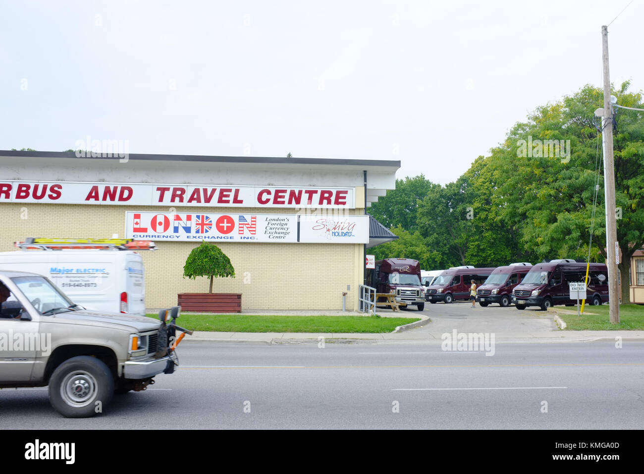 Buses outside a travel centre in London, Ontario in Canada. Stock Photo
