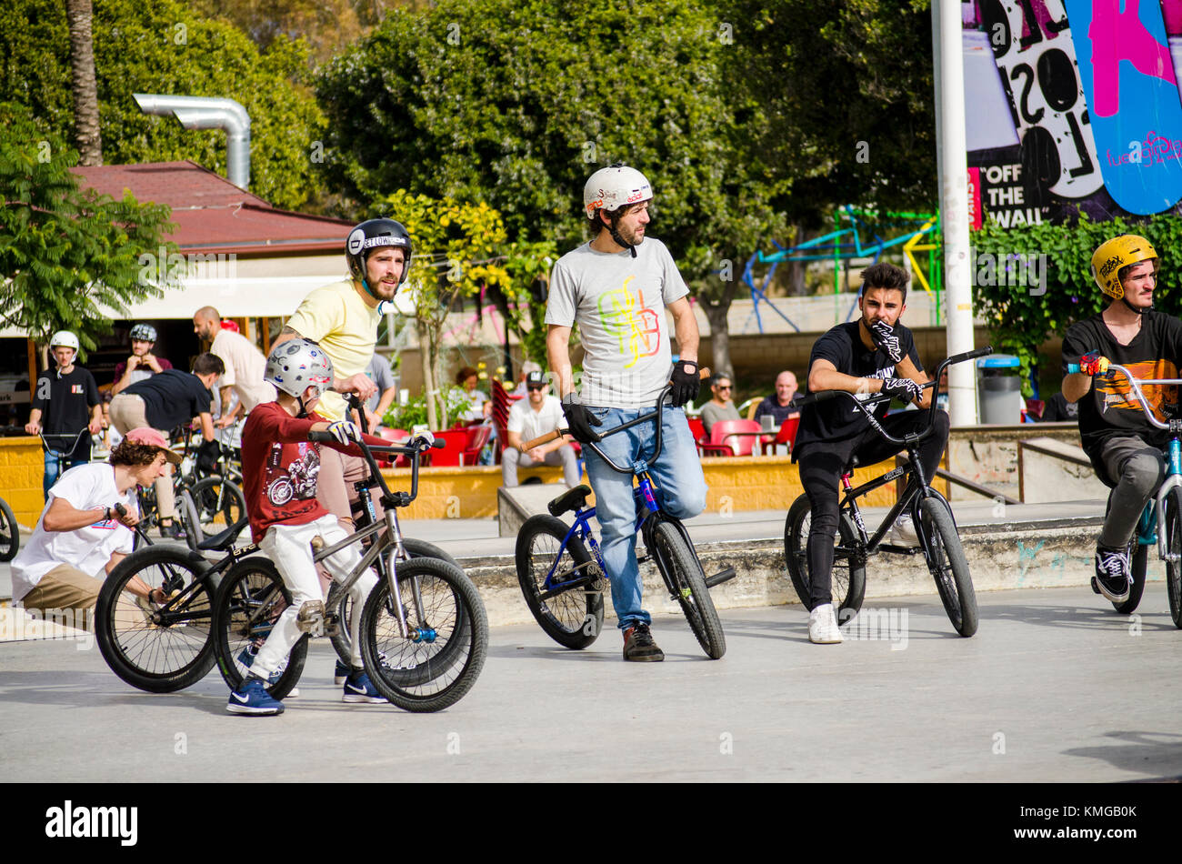 group of Bmx riders at skate park, during freestyle competition
