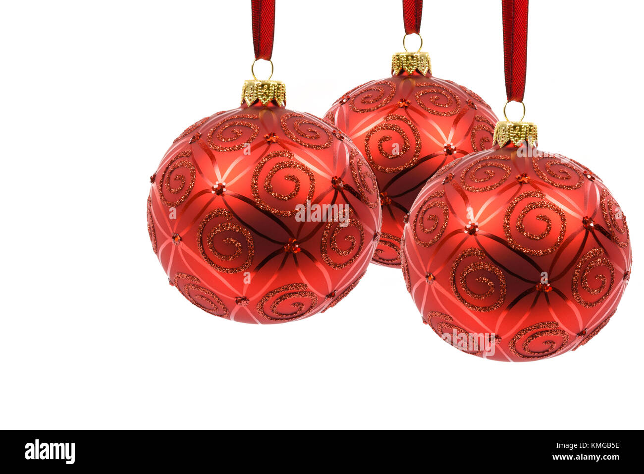 Perfect and ideal three red Christmas balls hanging on a red ribbon on ...