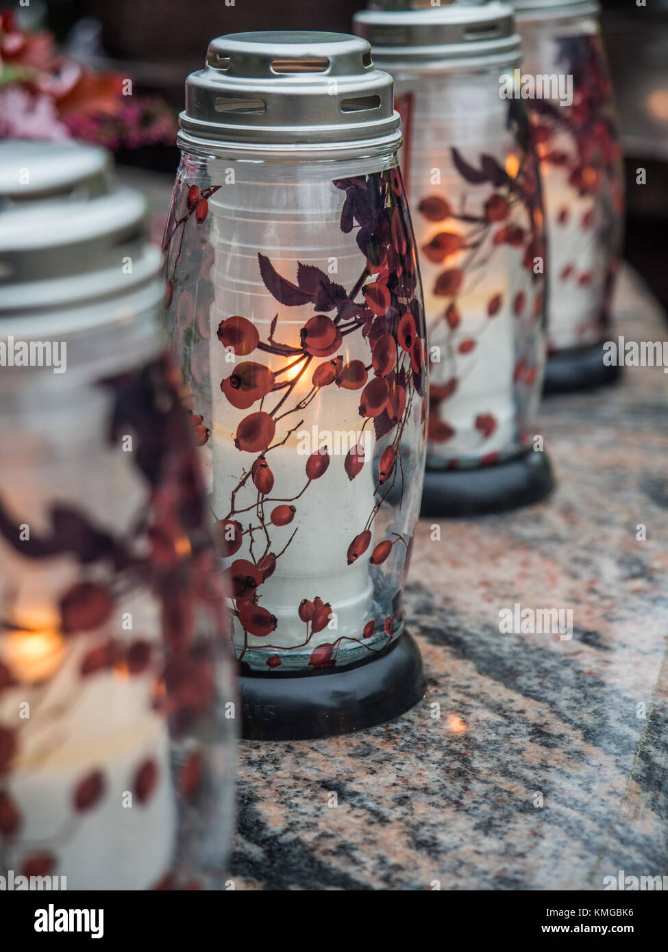 The cemetery torch burns with a bright light in the dark night Stock