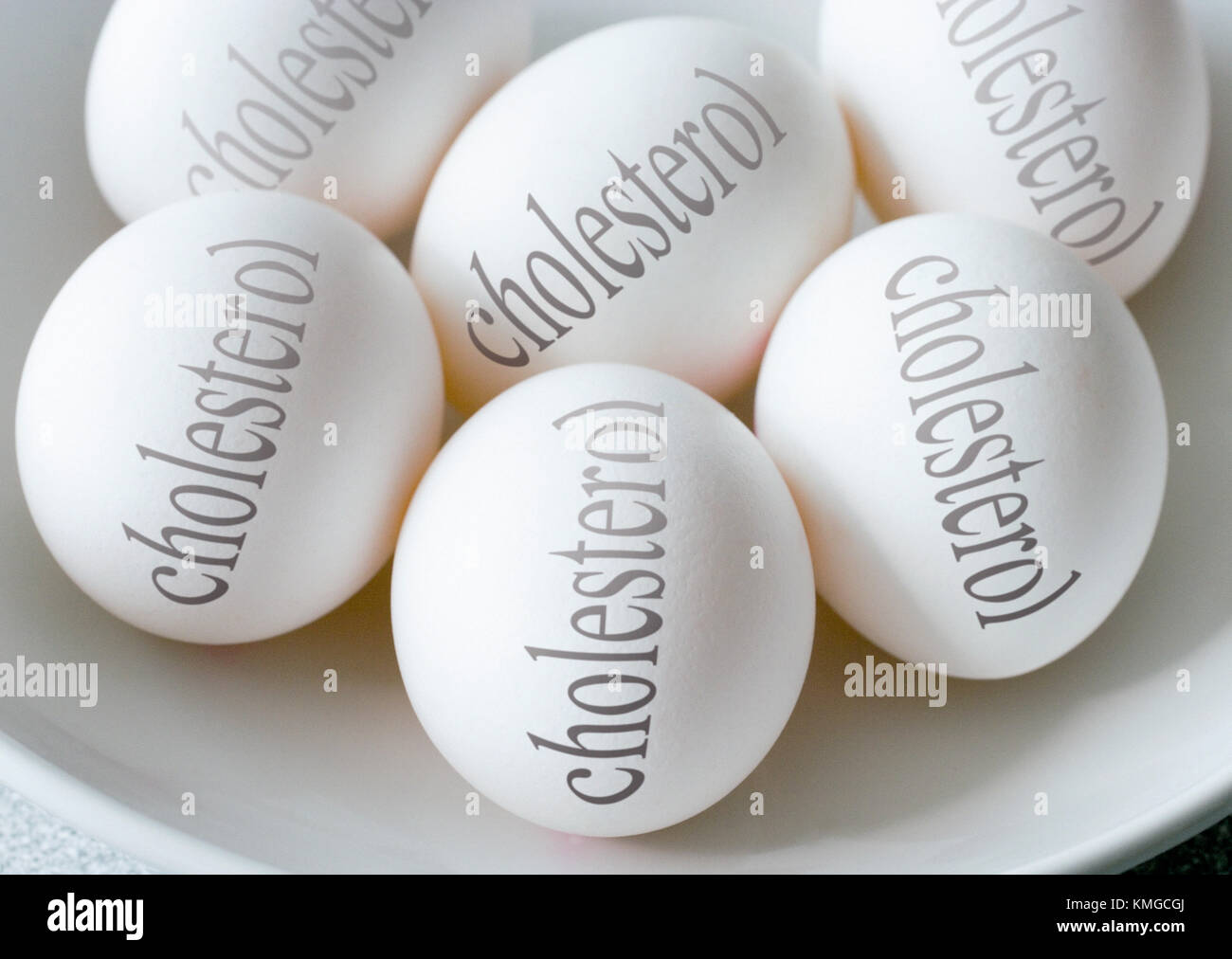 White eggs with Cholesterol text health and healthy lifestyle bio