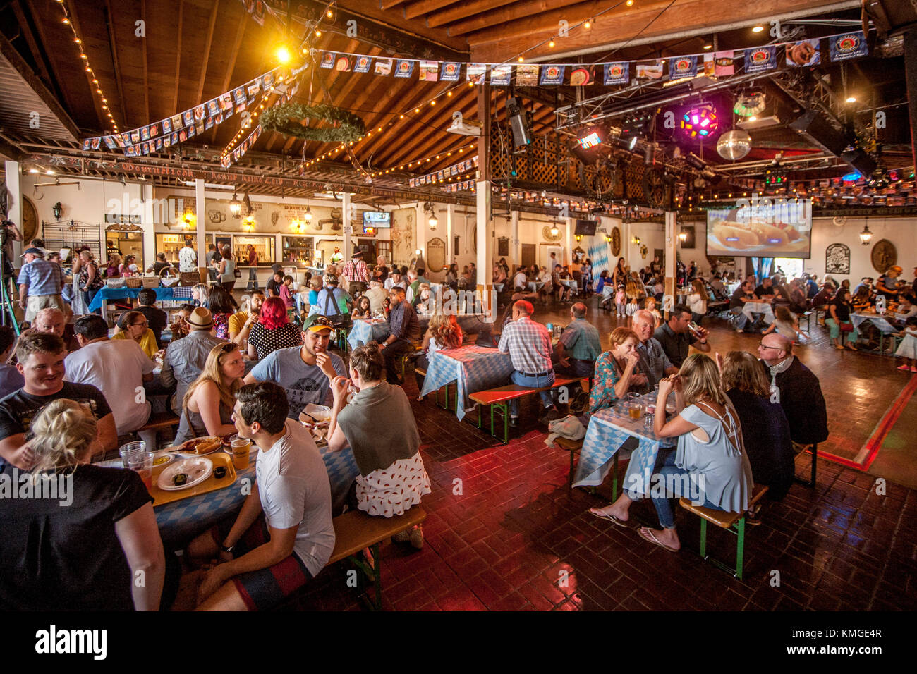 Hundreds of Oktoberfest celebrants enjoy beer hall socializing at Old