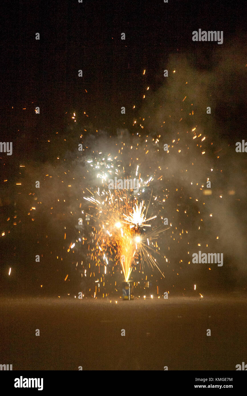 Legal "Safe and Sane" fireworks are seen from a police car celebrating