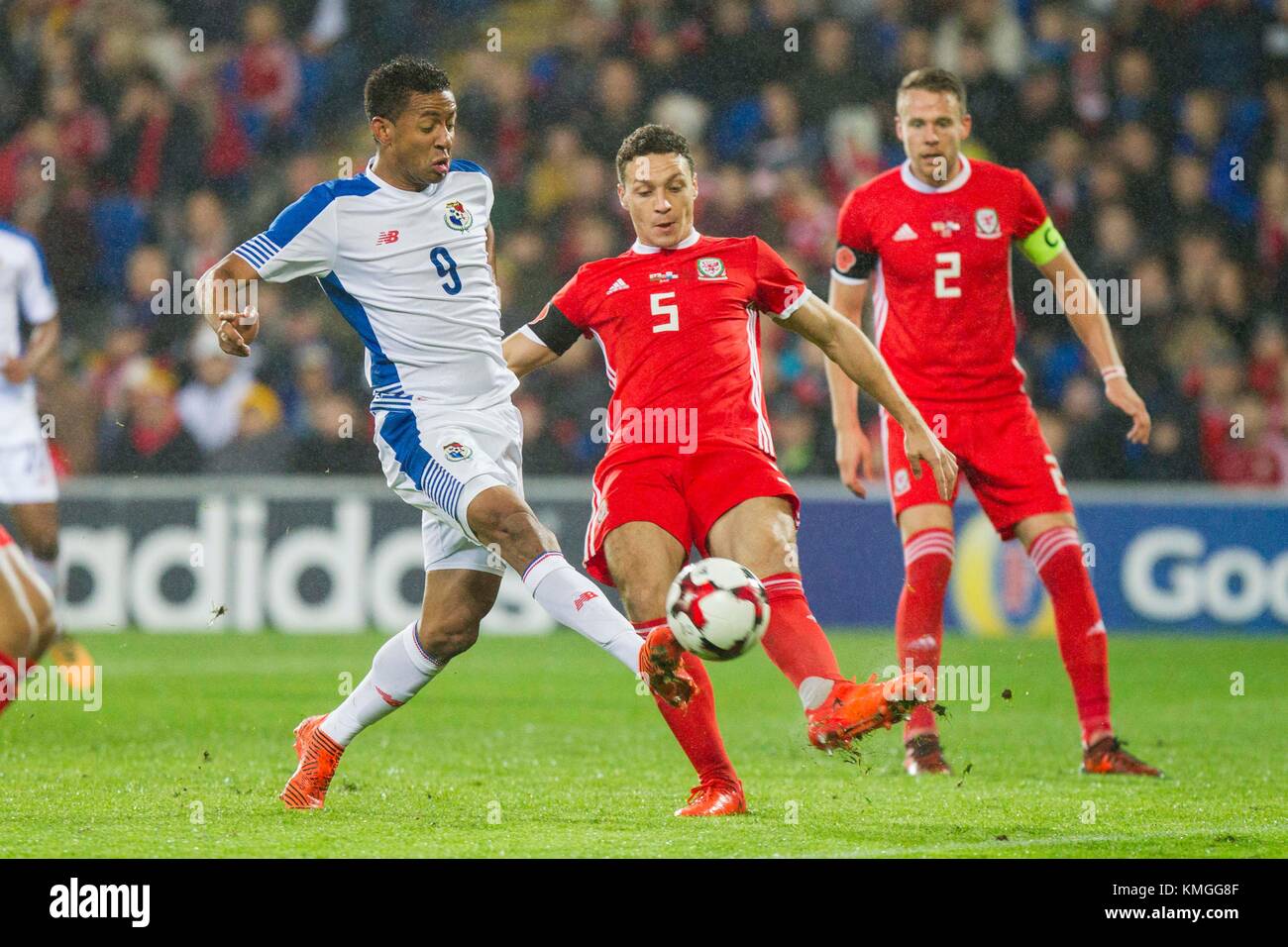 Cardiff, Wales, UK, 14th November 2017: James Chester of Wales clears from Gabriel Torres of Panama during an International friendly match between Wales and Panama at Cardiff City Stadium. Stock Photo