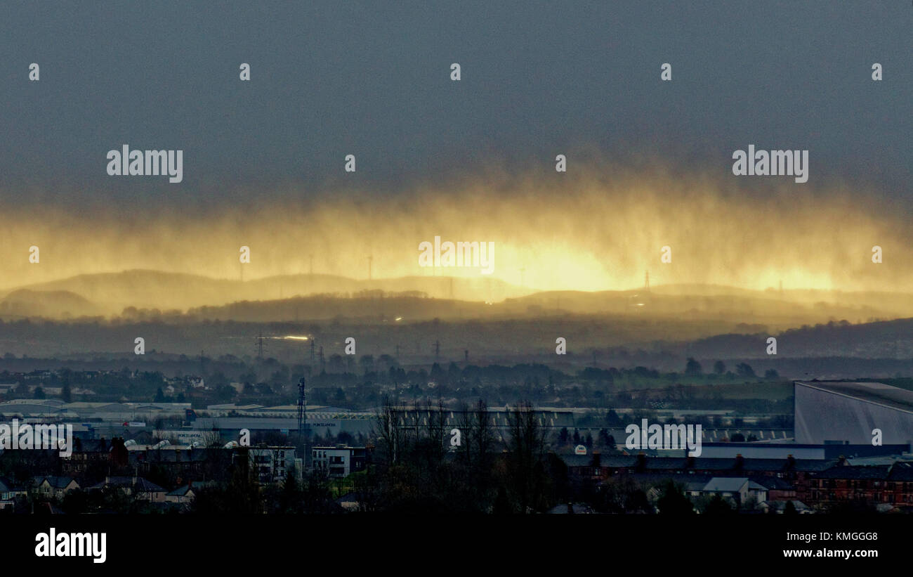 Glasgow, Scotland, UK  7th December. UK Weather: Storm Caroline over the southern hills and Whitelee Wind farm and braehead arena complex as wind and rain  hits Glasgow city. Credit Gerard Ferry/Alamy news Stock Photo