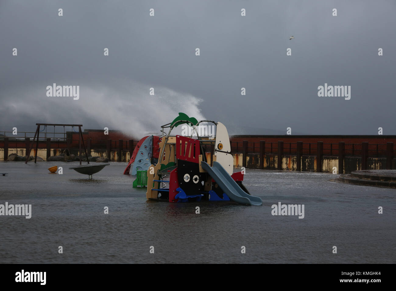 Scotland, Ayrshire, Prestwick. The former open air swimming pool which closed down many years ago and became a playpark briefly became a swimming pool and waterpark as Storm Caroline passed over Ayrshire Credit: Alister Firth/Alamy Live News Stock Photo