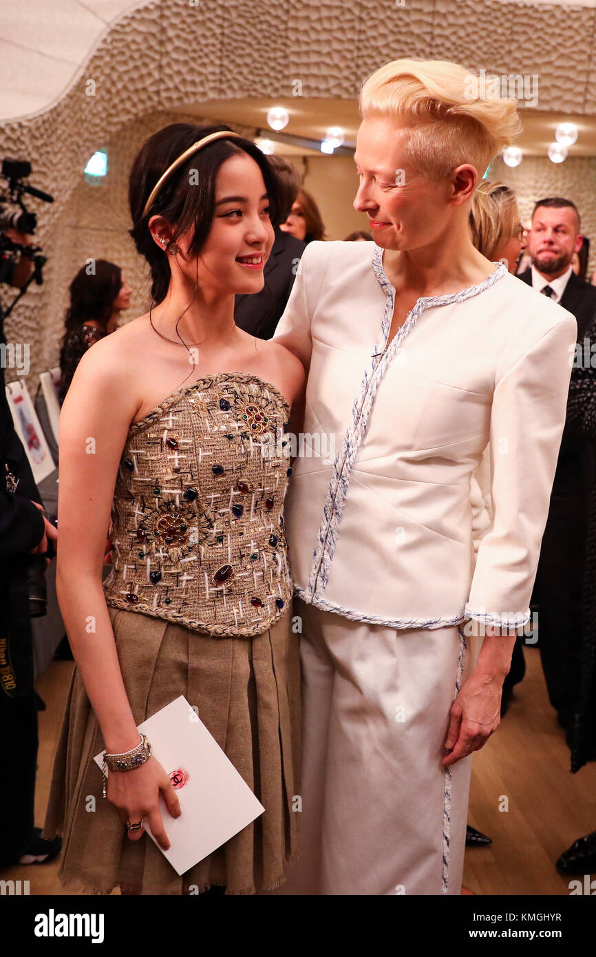 Hamburg, Germany. 6th Dec, 2017. Actresses Nana Ouyang and Tilda Swinton  (R) pose together at the Elbe Philarmonic Hall prior to Karl Lagerfeld's  fashion show in Hamburg, Germany, 6 December 2017. He