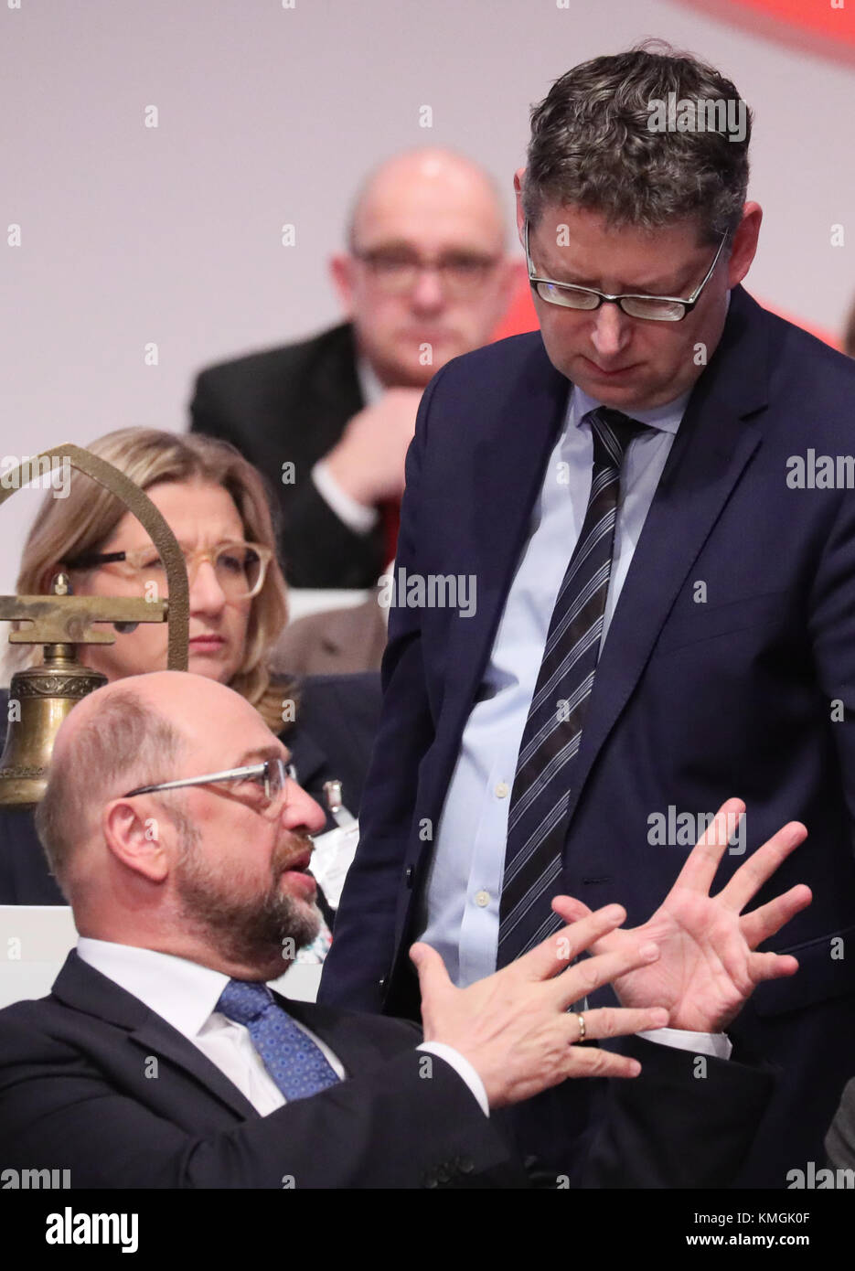 Berlin, Germany. 7th Dec, 2017. Federal Party Conference of the German Social Democratic Party in Berlin, Germany, 7 December 2017. Party leader Martin Schulz (L) and board member Thorsten Schaefer-Guembel converse. Credit: Kay Nietfeld/dpa/Alamy Live News Stock Photo