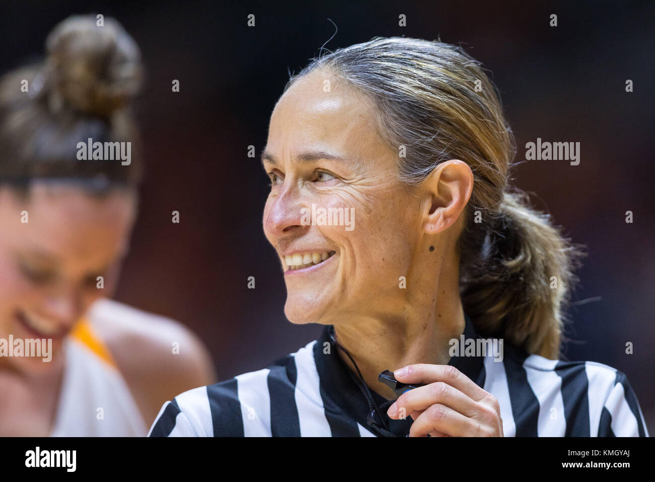 December 6, 2017 a referee smiles during the NCAA basketball game