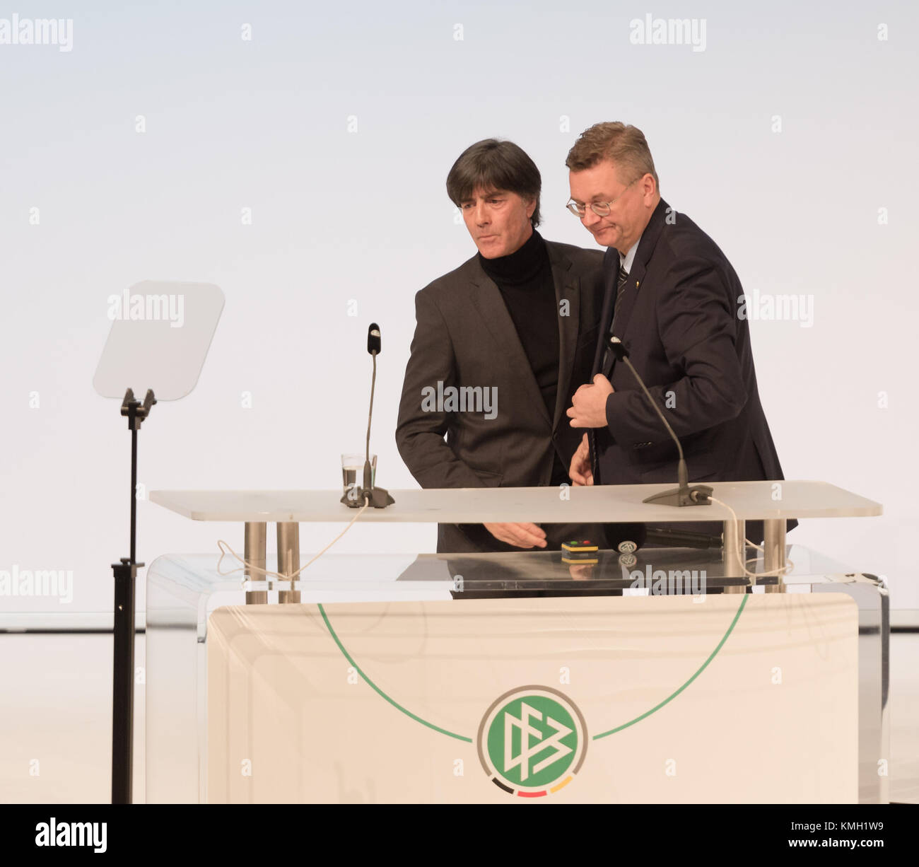 Frankfurt, Germany. 8th December, 2017. Extraordinay DFB Bundestag, Congress Center  . In the Picture: German National Team Head Coach Joachim Loew speaks to the audience and the DFB President Reinhard Grindel shake his hand. Photo by Ulrich Roth / ulrich-roth.com/Alamy Live News Stock Photo