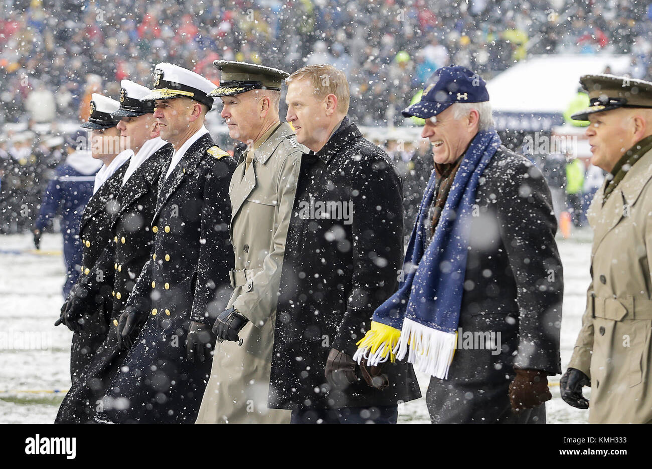 Philadelphia, Pennsylvania, USA. 9th Dec, 2017. Chairman of the Joint Chiefs of Staff, General Joseph Dunford, leads the Navy side out to the coin toss before the 118th Army Navy game between the United States Naval Academy Midshipmen and the United States Military Academy Cadets at Lincoln Financial Field in Philadelphia, Pennsylvania. Justin Cooper/CSM/Alamy Live News Stock Photo