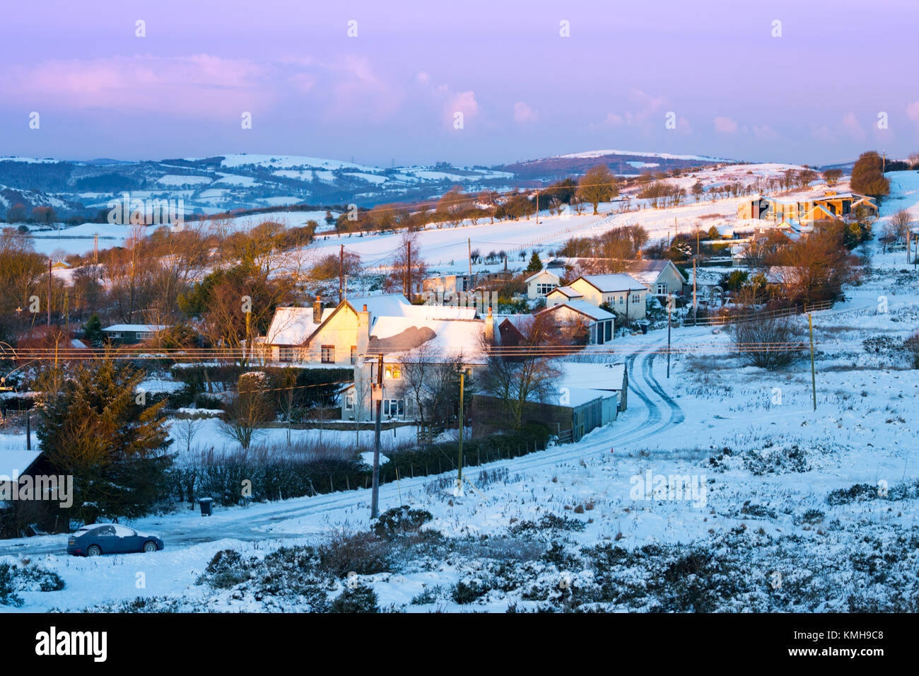 A wintry sunrise over the village of Moel y Crio on Halkyn Mountain at