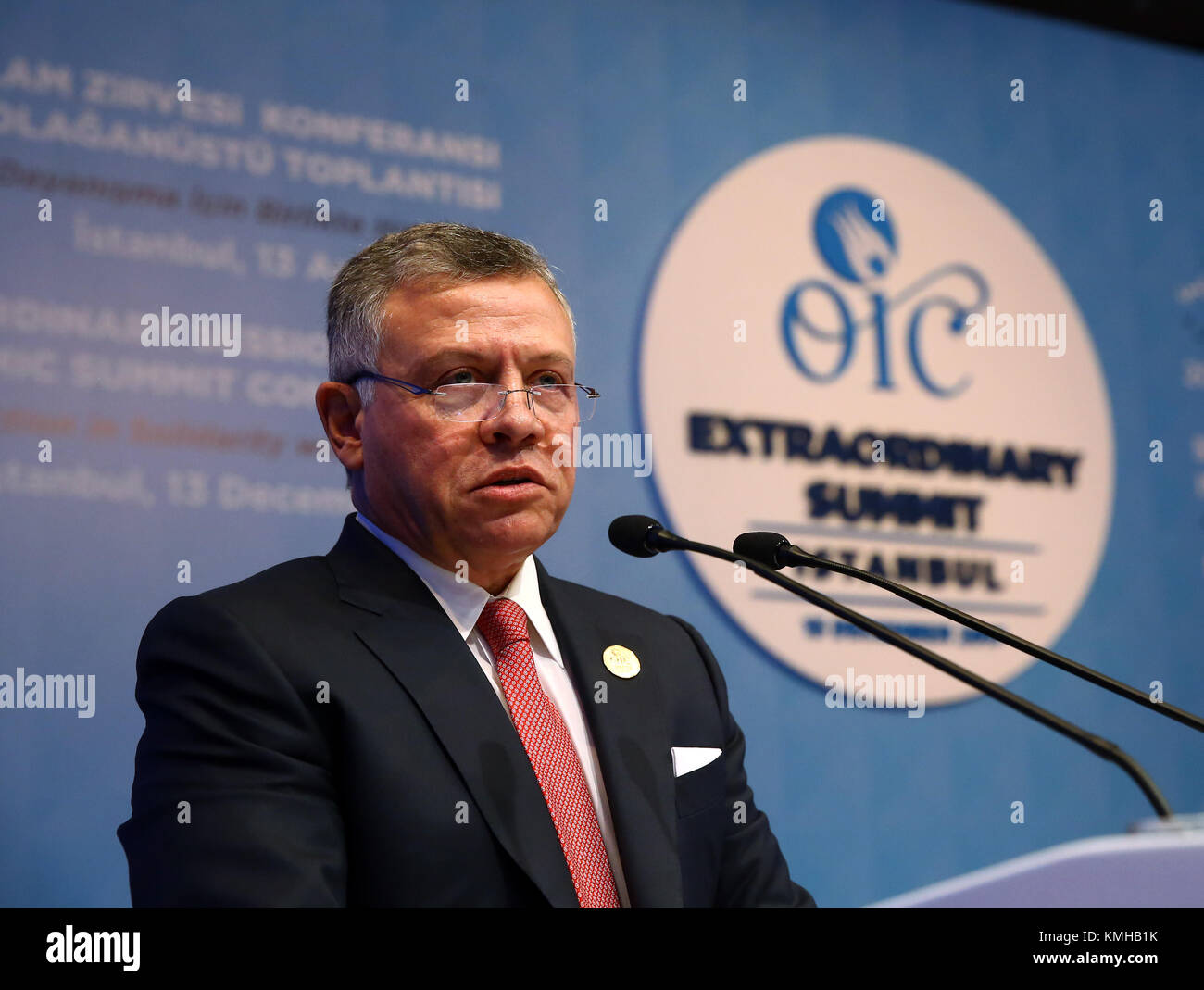Istanbul, Turkey. 13th Dec, 2017. Jordanian monarch King Abdullah II delivers a speech during the extraordinary summit of the Organization of Islamic Cooperation (OIC) in Istanbul, Turkey, on Dec. 13, 2017. Turkish President Recep Tayyip Erdogan on Wednesday urged the Islamic world to recognize Jerusalem as the capital of Palestine, while Palestinian President Mahmoud Abbas refused any U.S. involvement in the peace process. Credit: Anadolu Agency/Xinhua/Alamy Live News Stock Photo