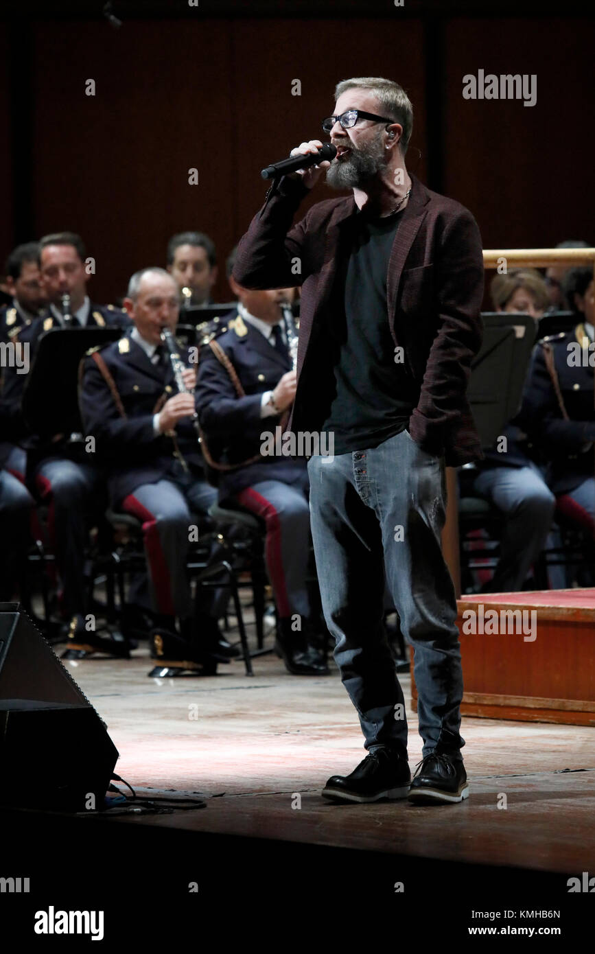 Rome, Italy - 11 December 2017: Marco Masini sings on the stage of the Auditorium Parco della Musica, on the occasion of the concert of the State Police Band, 'Being there always, with music and words'. Stock Photo