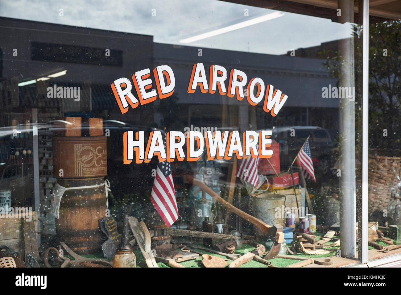 Red Arrow Hardware store vintage window in small rural Alabama town in the southern USA, Prattville Alabama USA. Stock Photo