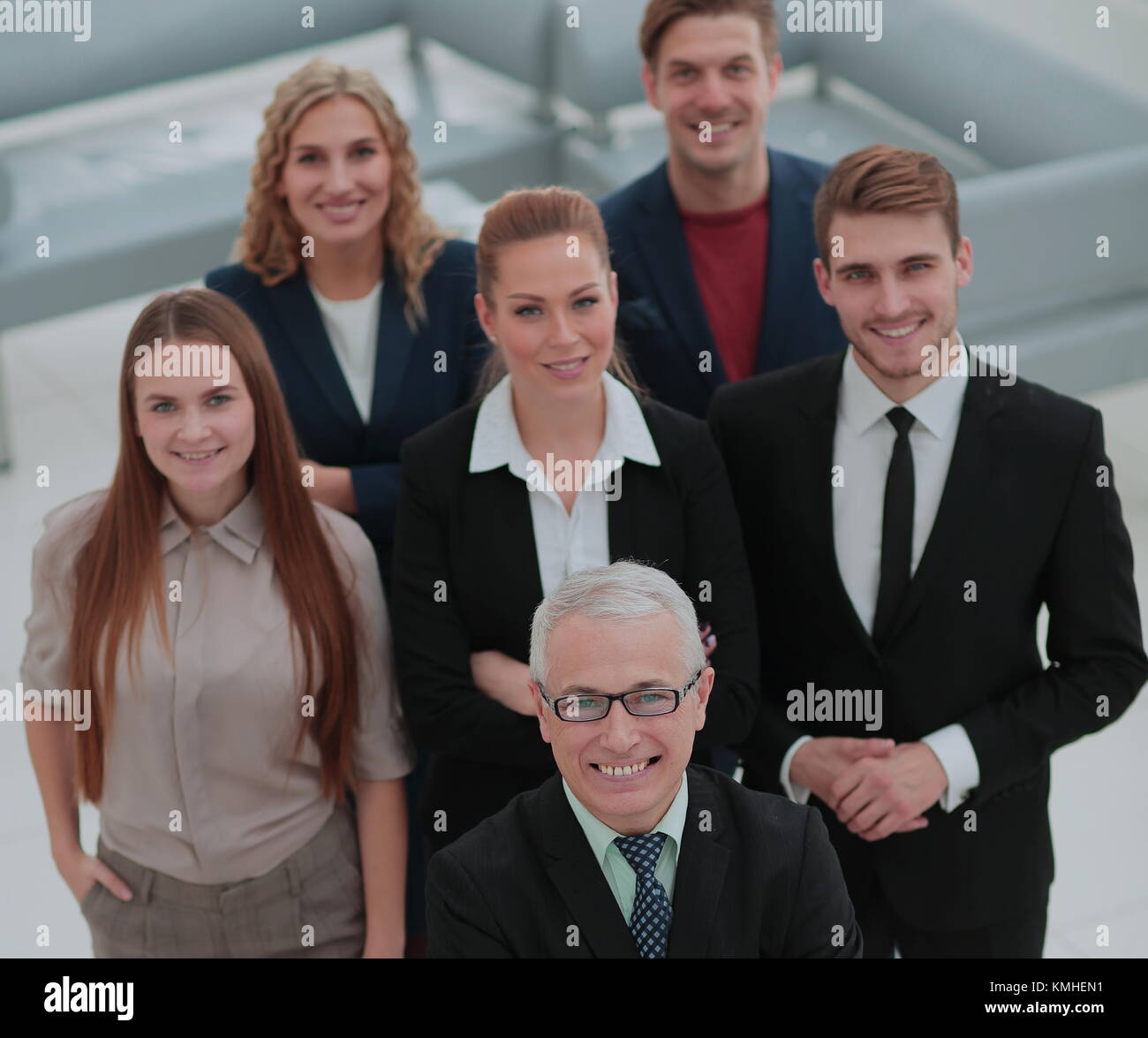 Smiling and confident business team standing in a conference room Stock ...
