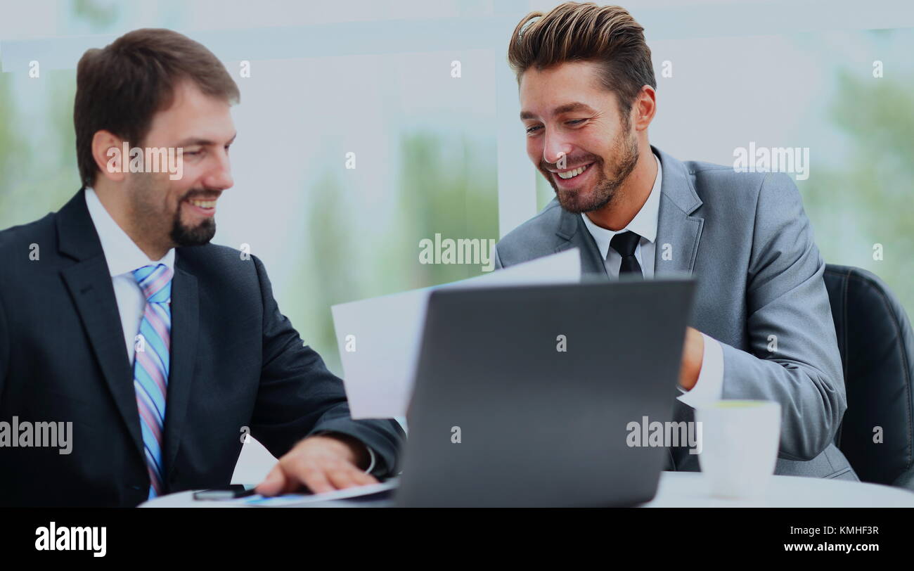 Two businessmen discussing tasks Stock Photo - Alamy