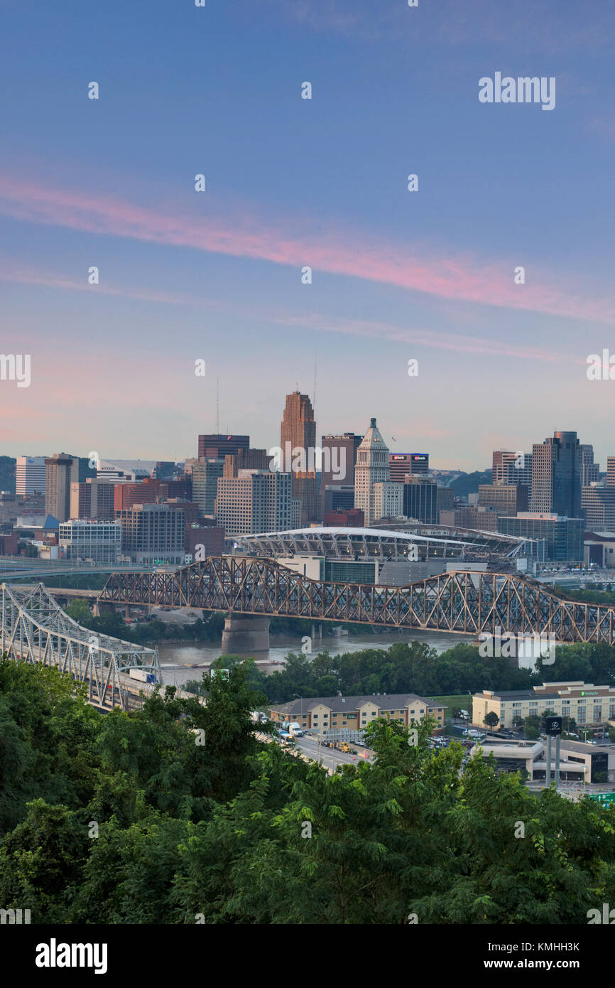 Colorful Sunset over a Skyline of Cincinnati, Ohio from Devou Park in Kenton Hills, Kentucky from Across the Ohio River Stock Photo