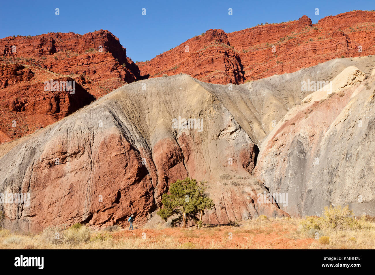 Onion Creek Canyon near Moab in Utah, USA with a photographer in the