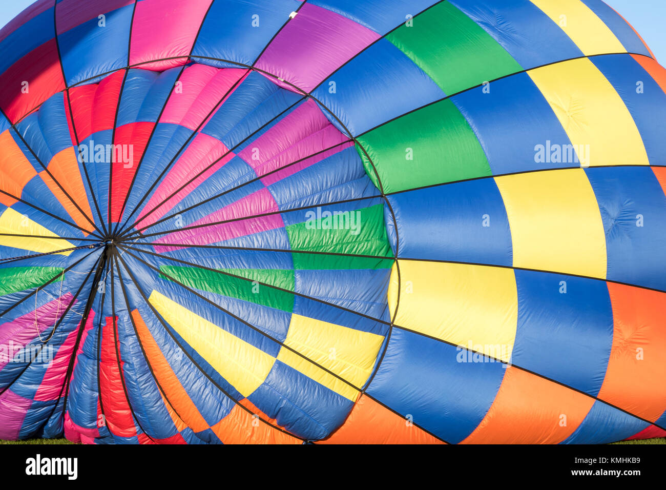 Partially inflated colorful checkerboard hot air balloon Stock Photo