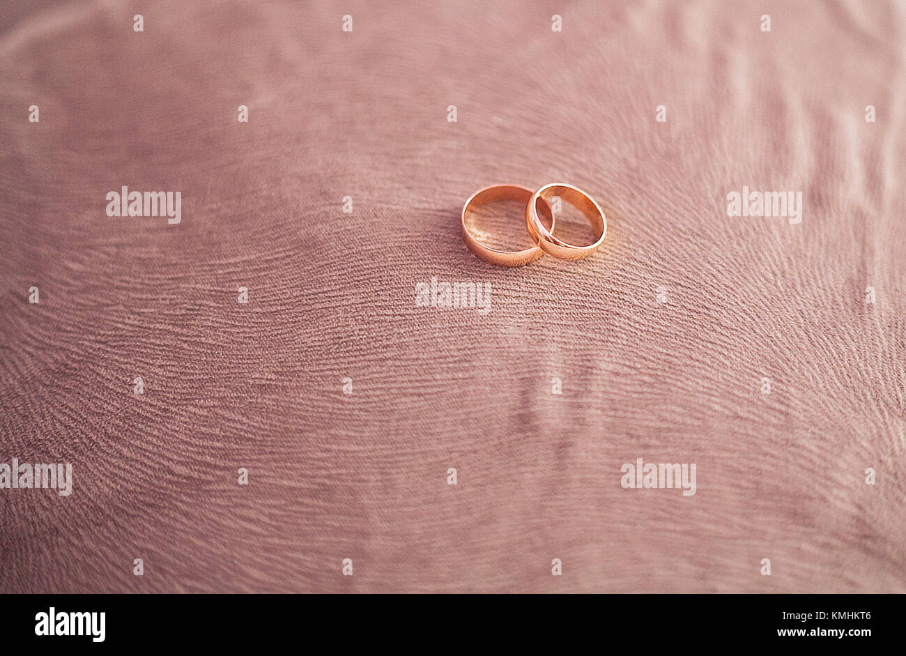gold wedding rings, wedding rings on the couch Stock Photo Alamy