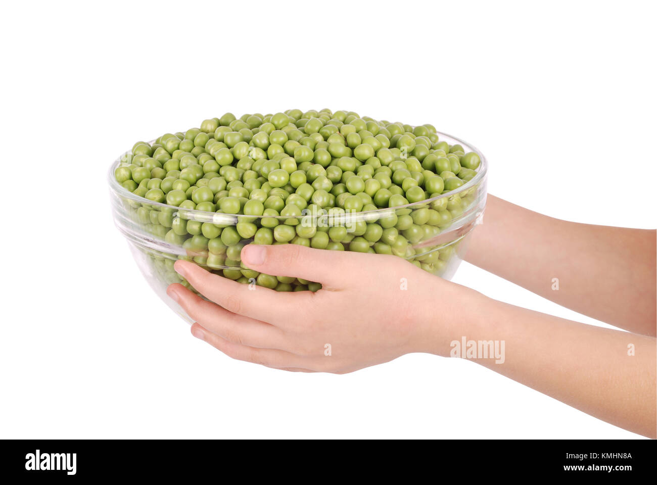 Green small spherical seeds of the pod fruit Pisum sativum, an edible