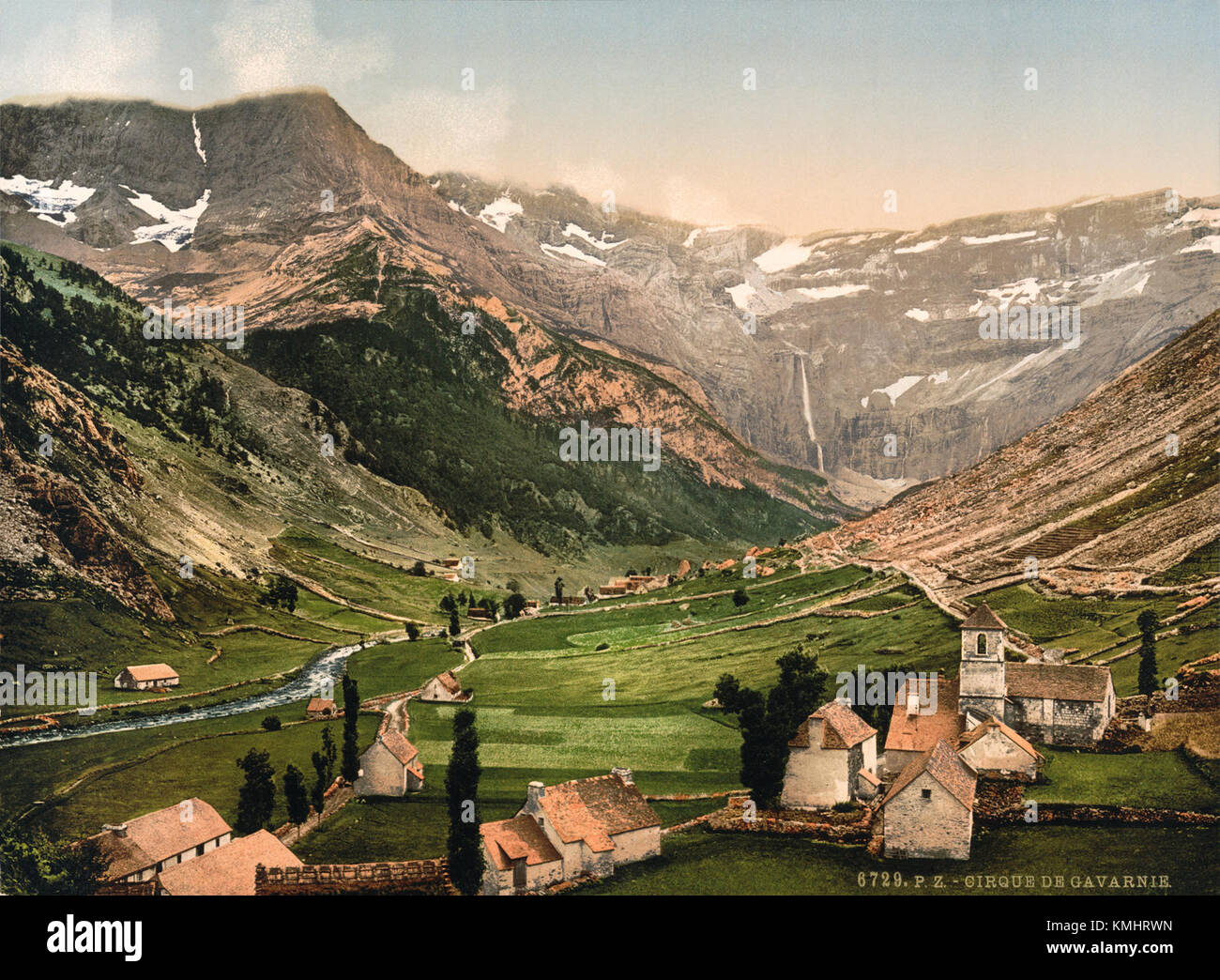 The Cirque de Gavarnie is a natural amphitheater located in the French Pyrenees, and the photochrom restored image highlights its dramatic scenery. Known for its towering cliffs and waterfall, this UNESCO World Heritage site offers a glimpse into the natural beauty of the region. The restored photochrom provides a vivid and historic portrayal of the landscape, showcasing the grandeur of the mountains and natural formations. Stock Photo