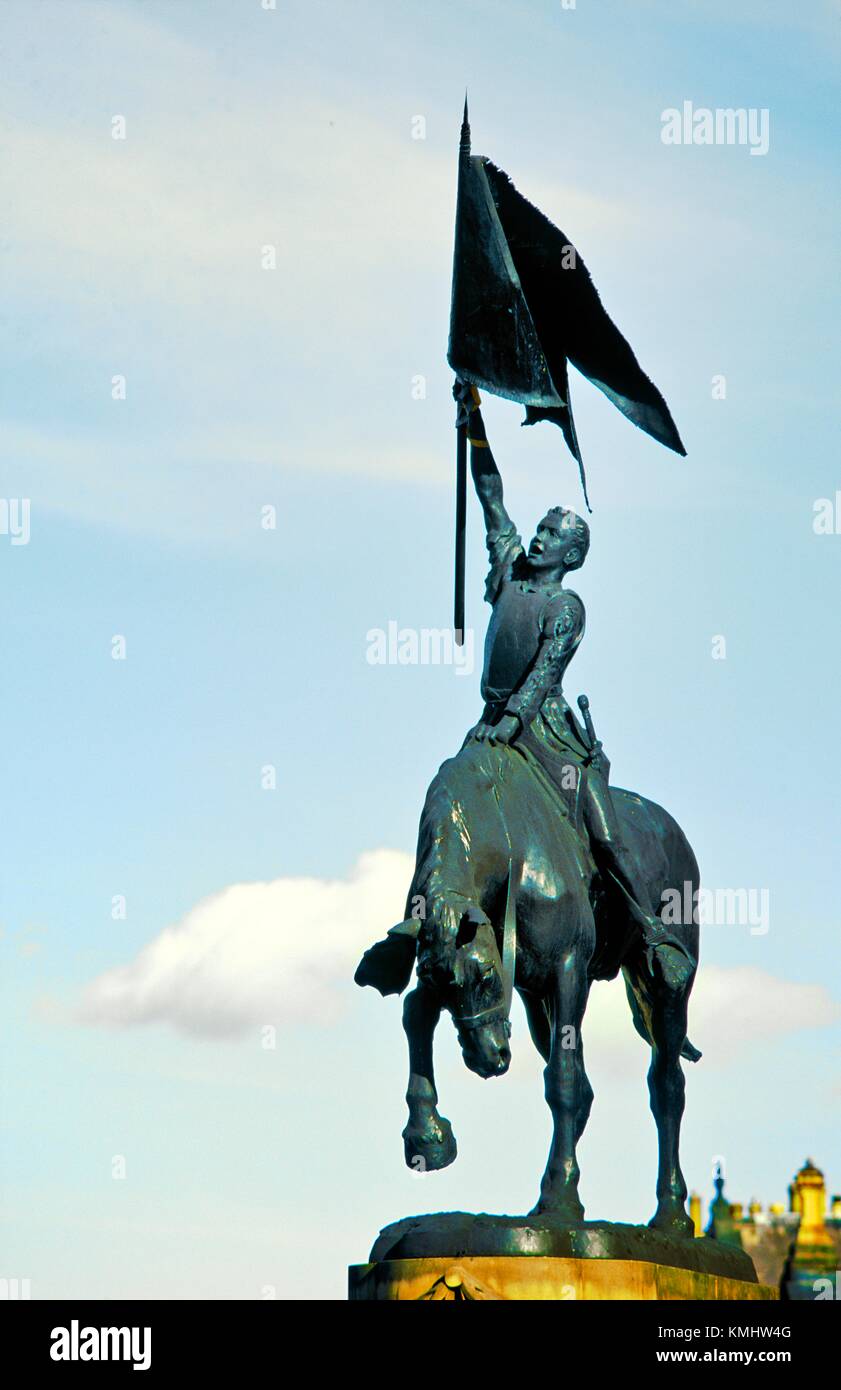 The Horse statue, Hawick, commemorates 1514 victory over English at nearby Hornshole. Local lad with captured Abbot’s banner Stock Photo