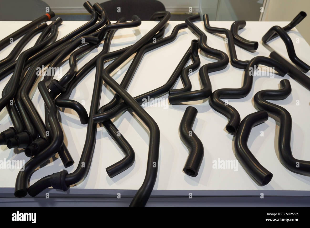 Automotive black rubber pipes on the table Stock Photo Alamy
