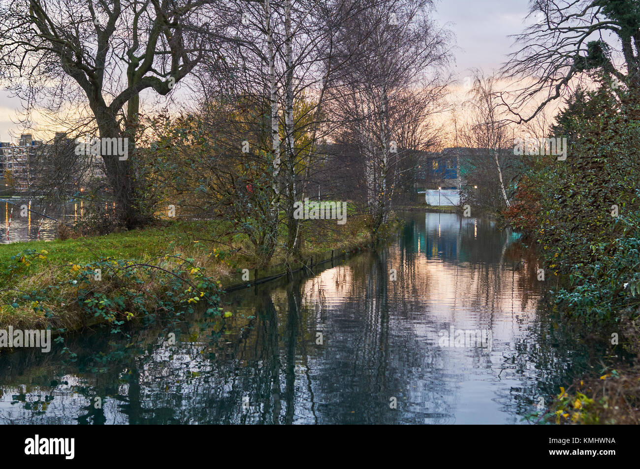 The New River at Woodberry Down, North London, in December at dusk Stock Photo