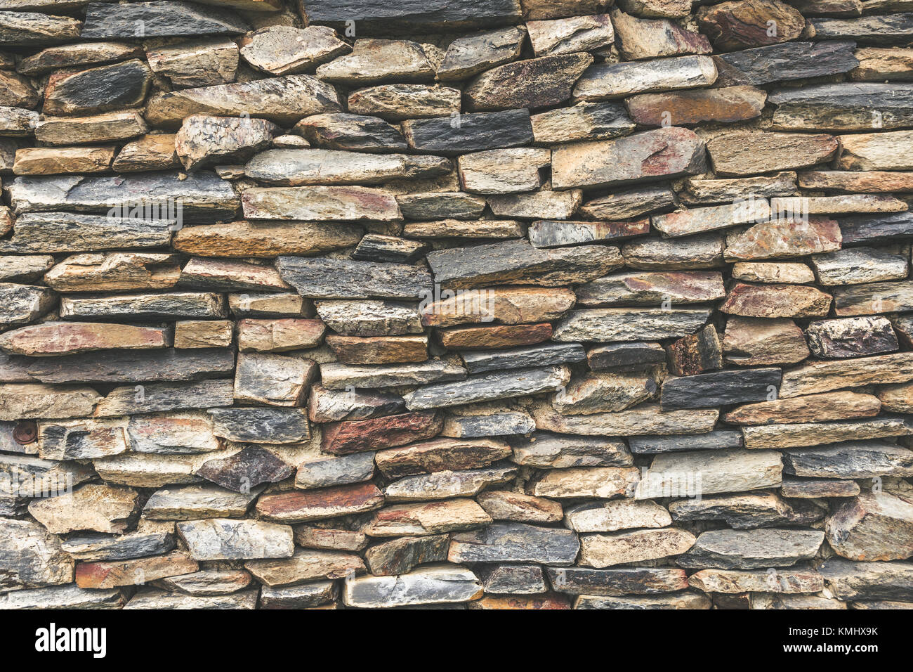 Stacked stone wall background Stock Photo Alamy