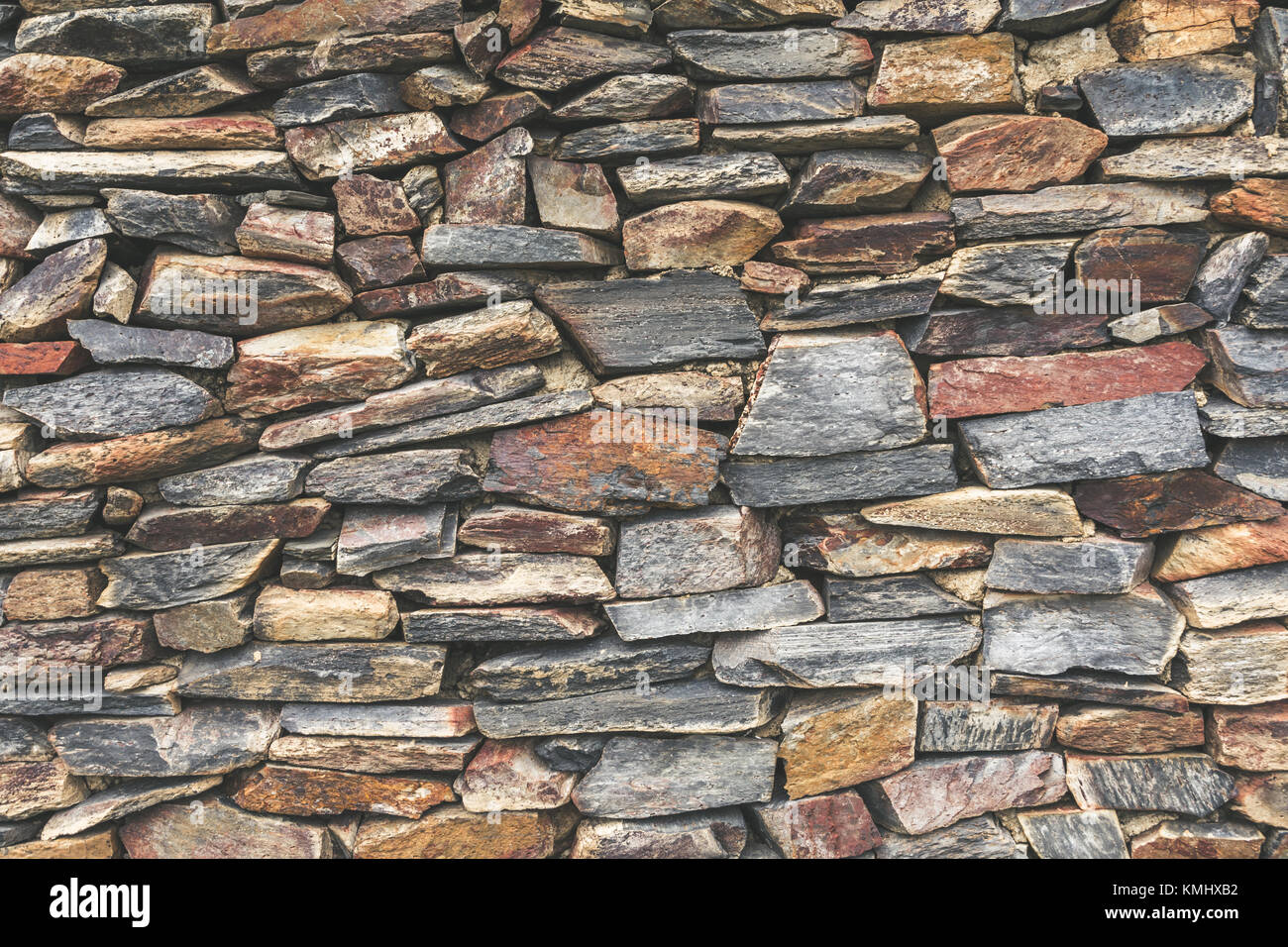Stacked stone wall background Stock Photo - Alamy