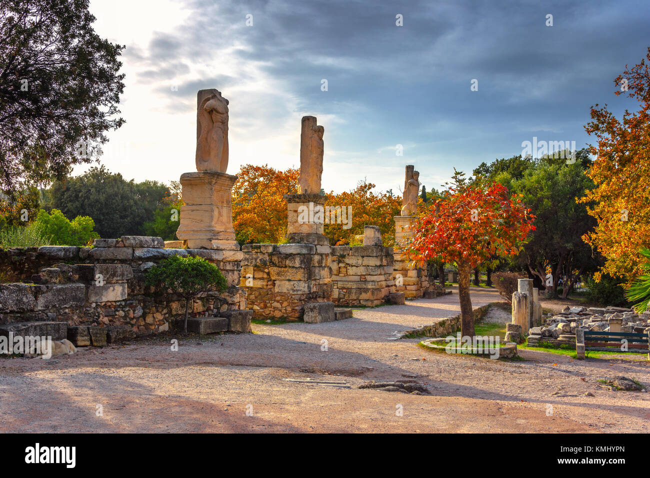 The entrance of ancient market (agora) with the ruins of the temple of Agrippa under the rock of Acropolis in Athens, Greece. Stock Photo