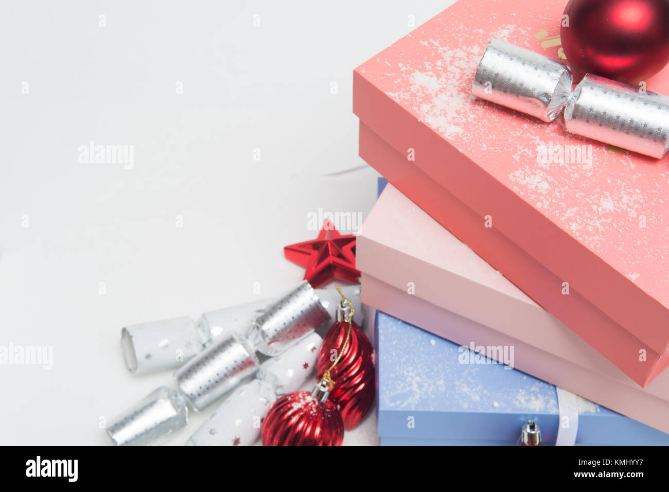 Luxury Christmas gifts in boxes with festive decorations Stock Photo
